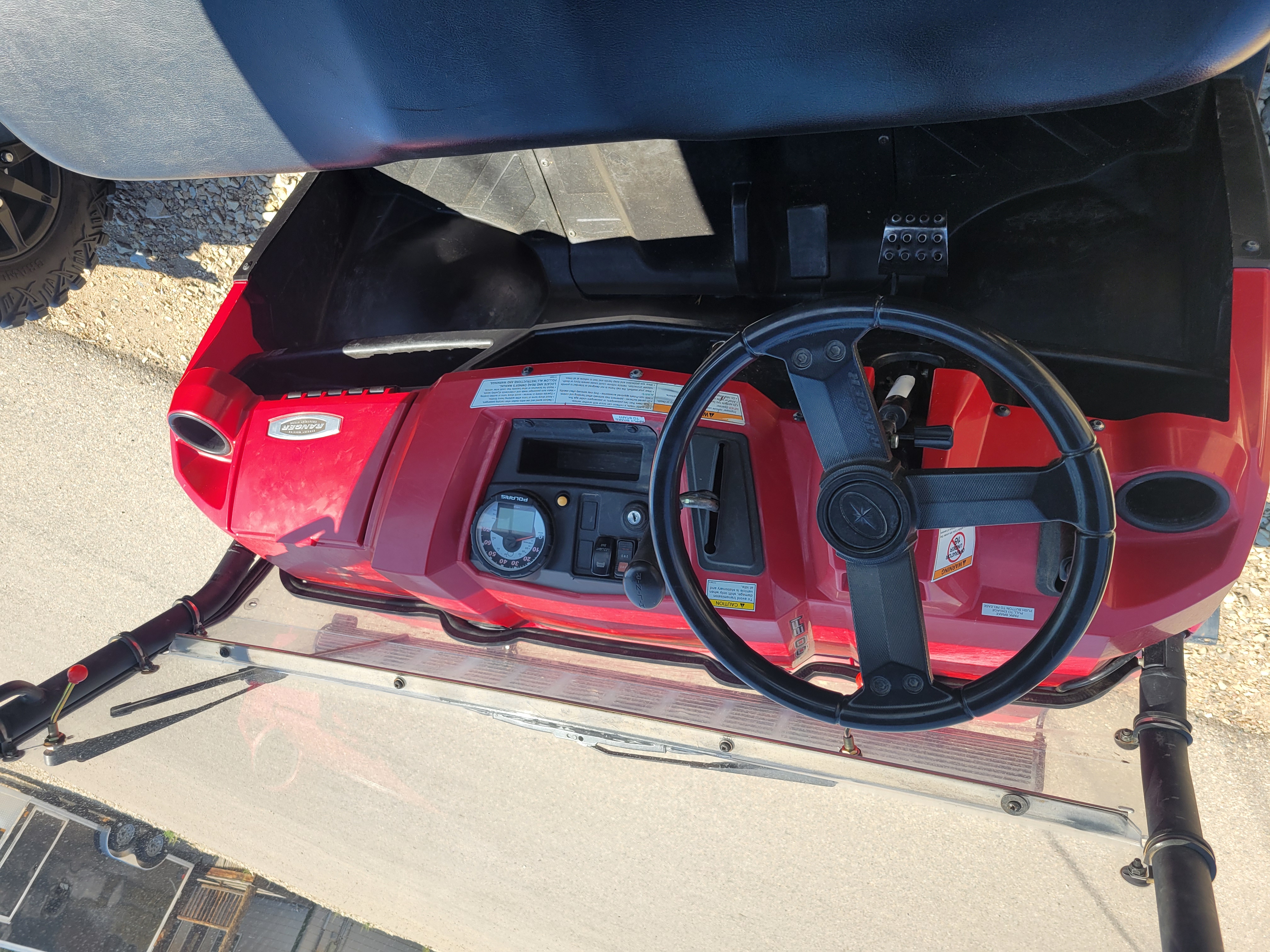 2009 POLARIS 4X4,700 EFI, SOLAR RED Utility