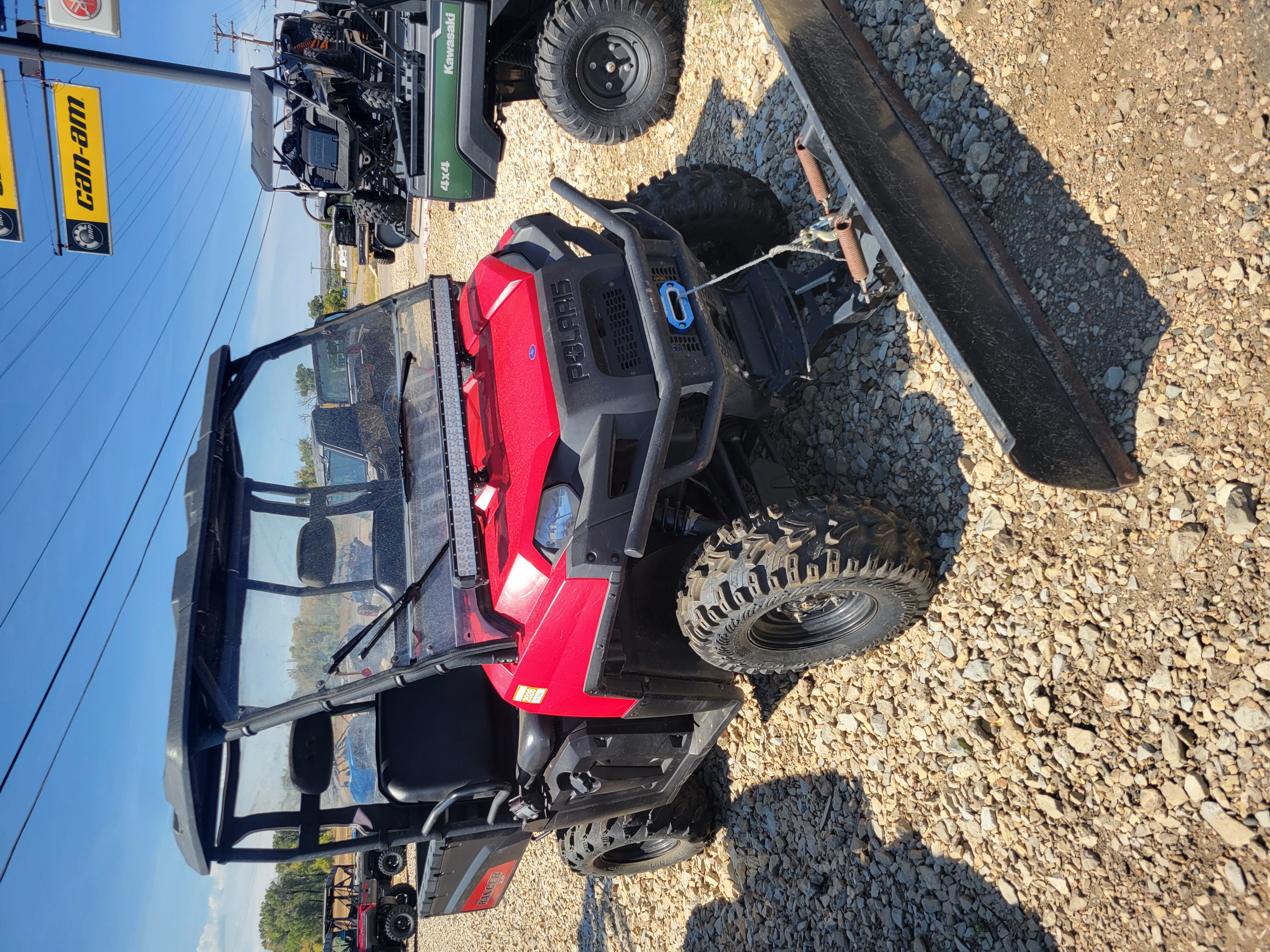 2009 POLARIS 4X4,700 EFI, SOLAR RED Utility