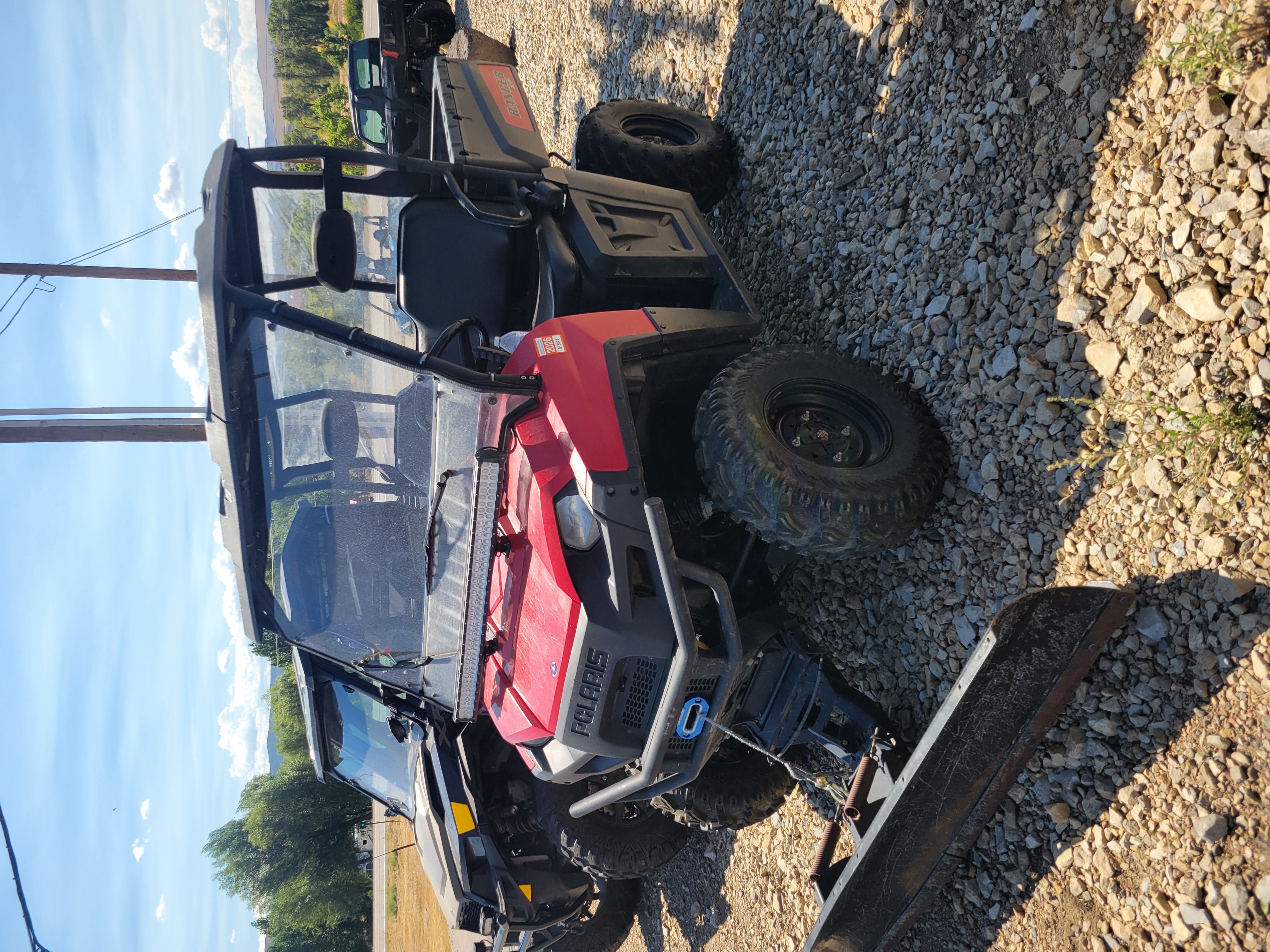 2009 POLARIS 4X4,700 EFI, SOLAR RED Utility